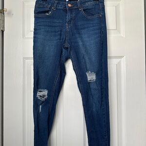 Super cute boutique jeans with fringed ankles.  SUPER CUTE!